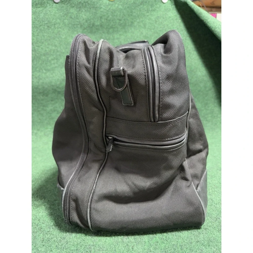 Tumi tag leather